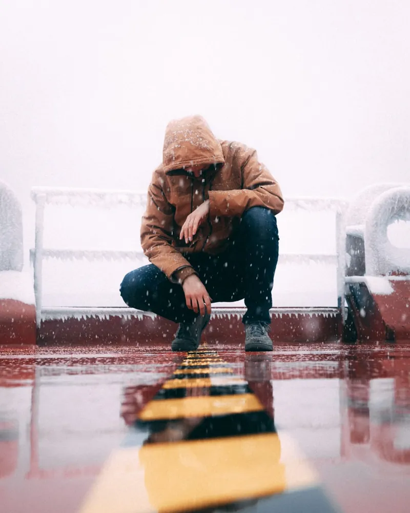 Evgeny on the snowy deck of the tanker