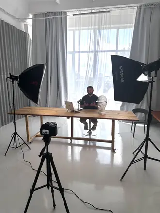 Office set with two softboxes and a camera