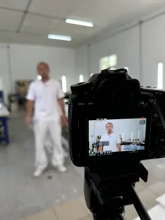 Shooting an expert in a workshop