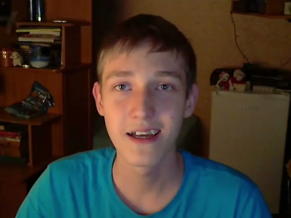 Evgeny in 2014, filming one of his first YouTube videos in his bedroom