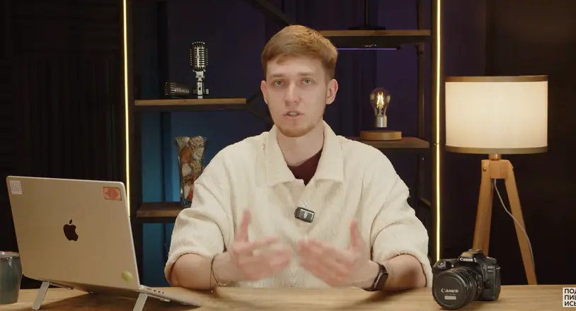 Final frame from a client video: expert talking to camera in a studio set