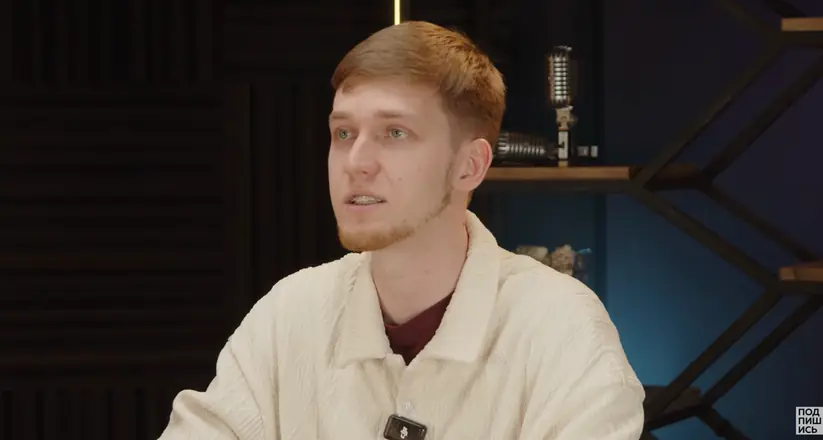 Final frame from a client video: expert talking to camera in a studio set