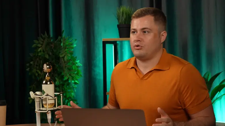 Final frame from a client video: expert in a studio set, close-up